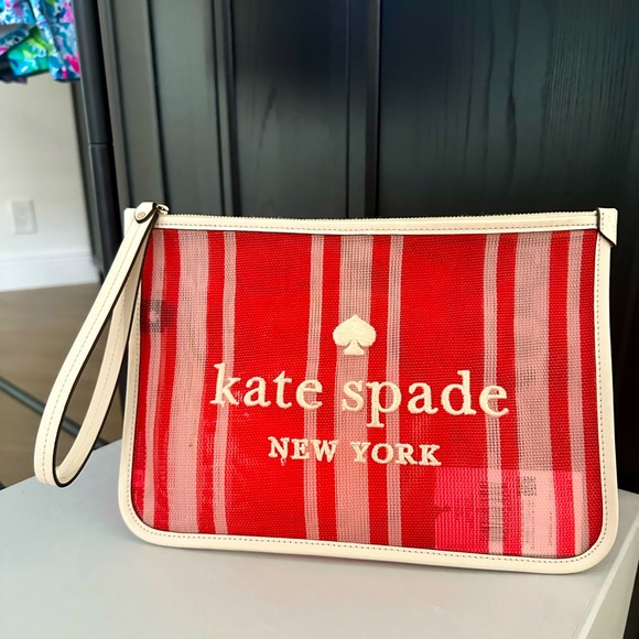 kate spade Handbags - Kate Spade - Mesh Beach Wristlet - coral and white, white leather piping.